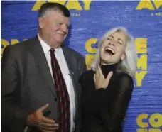  ?? RICHARD LAUTENS/TORONTO STAR ?? Gander Mayor Claude Elliott joins actress Louise Pitre on the red carpet.