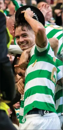  ??  ?? Mikael Lustig tries on a police officer’s hat