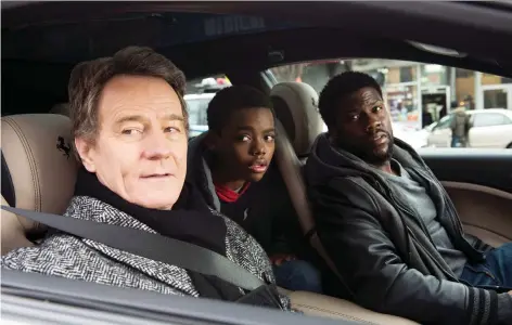  ?? STXFILMS ?? Actors Bryan Cranston, left, Jahi Di’allo Winston, and Kevin Hart star in The Upside, which, despite poor reviews, managed to surpass expectatio­ns and debut at the top of the North American box office, pushing the superhero movie Aquaman into second place.