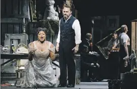  ?? Dania Maxwell Los Angeles Times ?? LOS ANGELES natives Angel Blue and Ryan McKinny, center, star in “Tosca.”