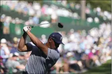  ?? DAVID J. PHILLIP — THE ASSOCIATED PRESS ?? Bryson DeChambeau hits his tee shot on the 14th hole during second round at the Masters golf tournament at Augusta National Golf Club Friday, April 12, 2024, in Augusta, Ga.