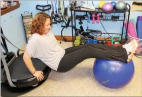  ??  ?? Shannon Anthony does an advanced tricep dip on a vibration exercise machine while also using a core balance ball. Vibration platforms stimulate the body’s natural stretch reflex.