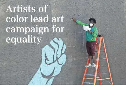  ?? PHOTOS BY GAELEN MORSE/COLUMBUS DISPATCH ?? A massive mural completed Sunday in the Milo-grogan neighborho­od is part of an effort by the Maroon Arts Group and the Greater Columbus Arts Council.