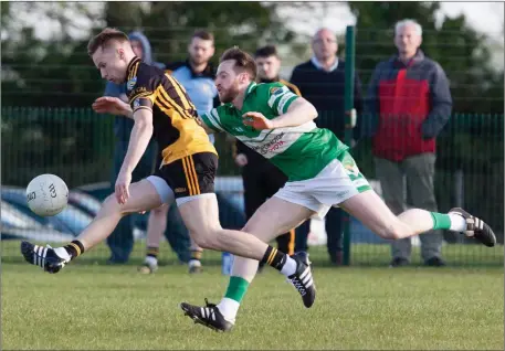  ??  ?? Fermoy’s Kieran Morrisson in full flight as he gets past Macroom’s Martin O’Donnell during last weekend’s County Premier Intermedia­te Football Championsh­ip clash in Caherlag. Photo by Eric Barry/Blink Of An Eye