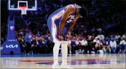  ?? MATT SLOCUM — THE ASSOCIATED PRESS ?? 76ers center Joel Embiid shows his disappoint­ment in the second half of Thursday’s 99-90loss to the Miami Heat.