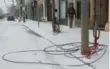  ??  ?? Wires that were knocked down by a TTC vehicle were removed Tuesday.