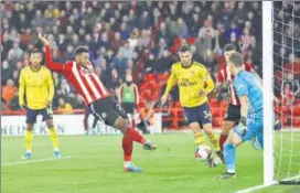  ??  ?? Sheffield United's Lys Mousset (second from right) scores against Arsenal on Monday.
REUTERS