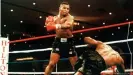  ??  ?? Mike Tyson knocks out Trevor Berbick to earn his first world title