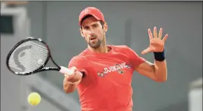  ?? Martin Sidorjak / Getty Images ?? Novak Djokovic of Serbia in action during a training session at Roland Garros on Friday in Paris.