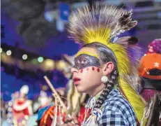  ??  ?? Chayton Hoskins, 14, of Lee Anders, Texas, waits to perform in the Team Boys Traditiona­l category during the 2019 Gathering of Nations.