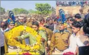  ?? HT PHOTO ?? Last rites of martyr Rohitash Lamba were performed at his native village Govindpura on Saturday.