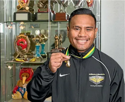  ?? SUPPLIED ?? Latu Talu just won a Golden Gloves title but has his sight set on an even bigger competitio­n.