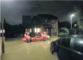  ?? IMAGE: ADAM SZYMICZEK ?? Lifeboats were on standby to help evacuate residents when a water main burst in West Drayton