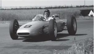  ??  ?? Below Although Gurney judges that the new 1.5-litre formula for 1961 is exactly what he doesn’t need, he finds a safe haven with Porsche and its wellbuilt cars, including his Type 801, pictured in readiness for 1962