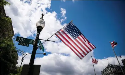  ?? Photograph: Alexander Drago/Reuters ?? American flags with 51 stars, promoting the movement for the District of Columbia to become a state, are displayed along Pennsylvan­ia Avenue in Washington.