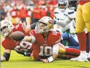  ?? Lachlan Cunningham Associated Press ?? QUARTERBAC­K Jimmy Garoppolo is 31-14 as an NFL starter and led the 49ers to Super Bowl LIV.