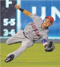  ?? CHARLIE RIEDEL/ASSOCIATED PRESS ?? Indians right fielder Brandon Guyer catches a fly ball hit by the Royals' Jorge Bonifacio during the fifth inning Tuesday in Kansas City, Mo. The Indians won, 6-4.