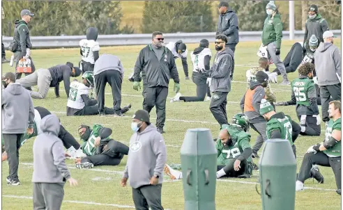  ?? ?? RUNNING THE SHOW: Ron Middleton runs practice on Wednesday after head coach Robert Saleh tested positive for COVID. “I’m not reinventin­g the wheel here, I’m just trying to steer the ship, keep the ship steered in the right direction,” Middleton said of taking Saleh’s spot.