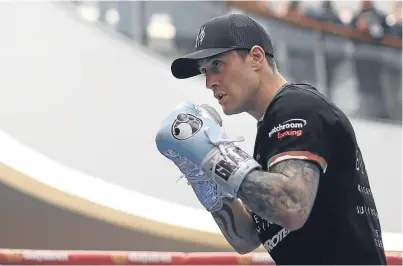  ?? Picture: Getty. ?? Ricky Burns takes part in a public workout at the St Enoch Centre in Glasgow ahead of his bout against Julius Indongo.