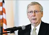  ?? TIMOTHY D. EASLEY/AP ?? The survey reveals what’s at stake as Senate Majority Leader Mitch McConnell struggles to round up votes to overhaul former President Barack Obama’s health care law.