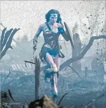  ?? Clay Enos Warner Bros. Entertainm­ent ?? GAL GADOT as Diana Prince/Wonder Woman hits the ground running in the global box office success “Wonder Woman.”