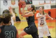  ?? SAM STEWART - DIGITAL FIRST MEDIA ?? Methacton’s Ryan DeOrio hits a runner in the lane during the third quarter to cut the deficit to eight.