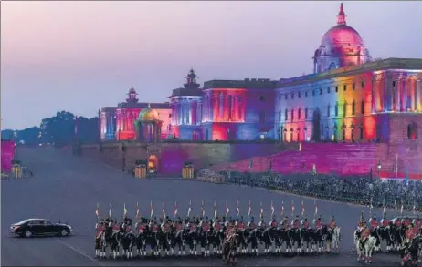  ?? PTI ?? Republic Day celebratio­ns culminated with the Beating Retreat ceremony at Vijay Chowk in New Delhi on Friday. About 26 performanc­es by military bands and several battalions participat­ed in the age-old military tradition that was once followed by troops during disengagem­ent from battle at sunset.