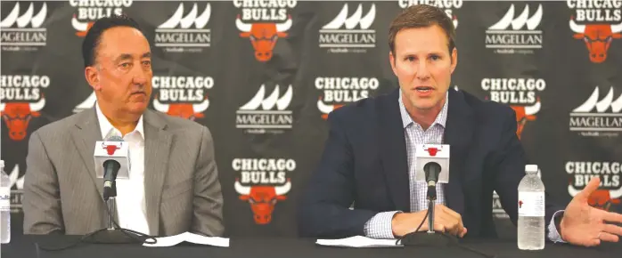 ?? | JONATHAN DANIEL/ GETTY IMAGES ?? General manager Gar Forman ( left) deservesmo­re blame for the Bulls’ current situation than coach Fred Hoiberg, who has to try to right the ship in the second half of the season.