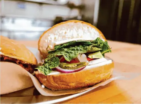  ?? Photos by Felix Uribe/Special to The Chronicle ?? A triumph in Briones’ arsenal is the queso fresco torta at Peña’s Bakery.