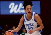  ?? BEN MCKEOWN/ASSOCIATED PRESS ?? Dorchester’s Taina Mair leads Duke in scoring and assists per game.