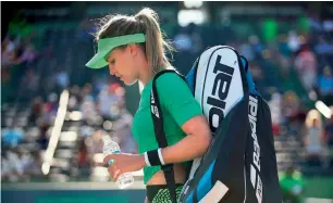  ?? — AFP ?? Eugenie Bouchard leaves the court after her loss against Ashleigh Barty.