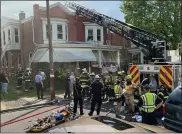  ?? EVAN BRANDT — MEDIANEWS GROUP ?? There was no shortage of personnel who responded to a house fire on West Fourth Street Wednesday.