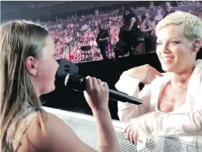  ??  ?? Victoria Anthony sings to musician Pink in this still image taken from a video posted on Anthony’s Twitter page. — THE CANADIAN PRESS