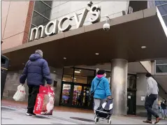  ?? CHARLES KRUPA - THE ASSOCIATED PRESS ?? The Macy’s store in Boston. Macy’s profit and sales for the holiday quarter slid with inflation leading some customers to pull back.