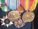  ?? RUSSELL CONTRERAS/ ASSOCIATED PRESS ?? Former Isleta Tribal councilman Diego Lujan wears his replacemen­t military medals during a special ceremony at Isleta Pueblo on Friday.