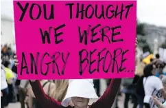  ?? BERNSTEIN / BLOOMBERG FILES ?? A demonstrat­or opposed to Supreme Court nominee Brett Kavanaugh holds a You Thought We Were Angry Before sign while protesting in Washington, D.C.