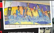  ??  ?? A mural celebratin­g Rose at Simeon Career Academy (above) and his childhood home (right)