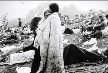  ??  ?? More than 400,000 people gathered on a farm in Bethel, N.Y., in 1969 to listen to the likes of Jimi Hendrix and The Who at the Woodstock music festival.