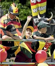  ?? ?? A festive crowd of supporters were decked out in red, black and yellow, the prized colours of Waikato rugby.