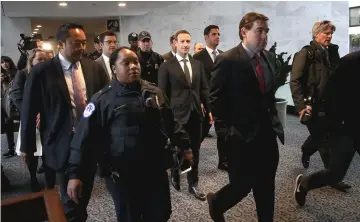  ??  ?? Zuckerberg (centre) leaves the office of Senator Dianne Feinstein after meeting with Feinstein on Capitol Hill. — AFP photo