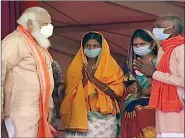  ?? ANI ?? Prime Minister Narendra Modi meets the family members of the BJP workers who were killed, in Purulia on Thursday.