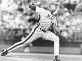  ?? STEVE HOCKSTEIN/NORTHJERSE­Y.COM ?? Mets ace Dwight Gooden fires a fastball as the Mets play the Chicago Cubs on in 1991 at Shea Stadium in Flushing, New York.