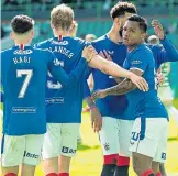  ??  ?? Morelos is congratula­ted on his equaliser.