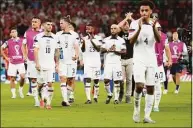  ?? Aijaz Rahi / Associated Press ?? American players leave the pitch after tying Wales in the World Cup on Monday.