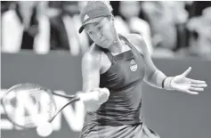  ??  ?? Osaka hits a return against Cibulkova. — AFP photo