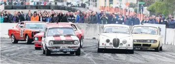  ?? PHOTO: SUPPLIED ?? Cars jostle for position on the track at the Waimate 50 Motorsport Festival.