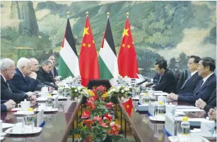  ?? (Mark Schiefelbe­in/Reuters) ?? PALESTINIA­N AUTHORITY President Mahmoud Abbas (second left) meets with Chinese President Xi Jinping (right) at the Great Hall of the People in Beijing yesterday.