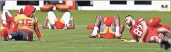  ?? AP-Brynn Anderson ?? Kansas City Chiefs quarterbac­k Patrick Mahomes (15) talks to tight end Travis Kelce (87) during practice on Wednesday.