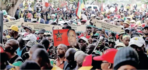  ?? | OUPA MOKOENA African News Agency (ANA) ?? SUPPORTERS of the tripartite alliance marched to the Kgosi Mampuru Correction­al Centre in Pretoria yesterday to protest the release of convicted murderer Janusz Walus on parole.