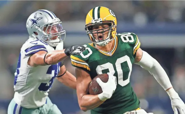  ?? HEITMAN-USA TODAY SPORTS TIM HEITMAN, TIM ?? Green Bay Packers tight end Jimmy Graham (80) is tackled by Dallas Cowboys strong safety Jeff Heath (38) in the second quarter at AT&T Stadium.